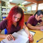 Students studying in library