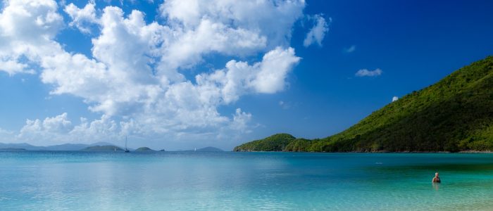 Caribbean beach with view of hills