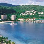 Hills surrounding a waterfront resort