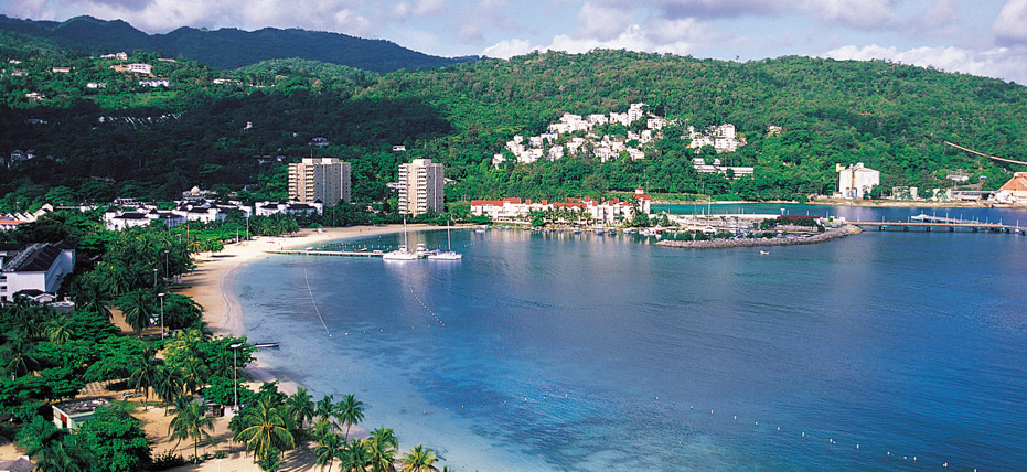 Hills surrounding a waterfront resort